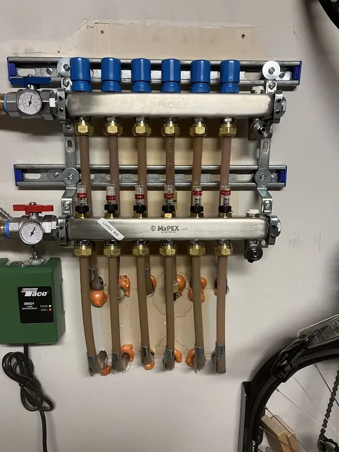 Plumber performing Gas Line Installation at a residential property in Columbia Falls